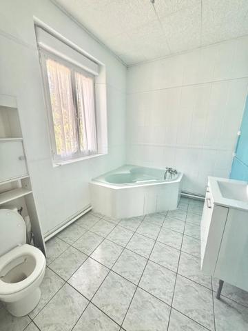 Ensemble immobilier avec local commercial et logement – Idéal investisseur ou projet familial/professionnel