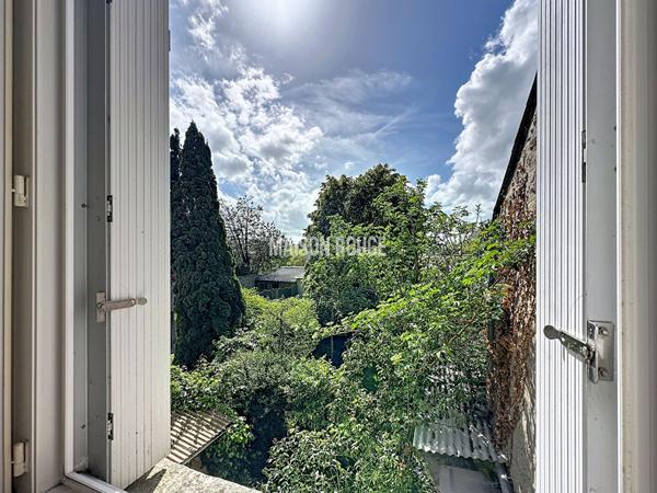 Maison de charme , 4 pièces, avec jardin exposé sud-ouest dans quartier recherché de Dinan