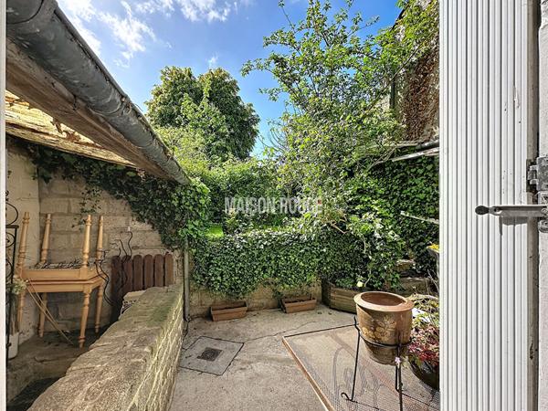 Maison de charme , 4 pièces, avec jardin exposé sud-ouest dans quartier recherché de Dinan