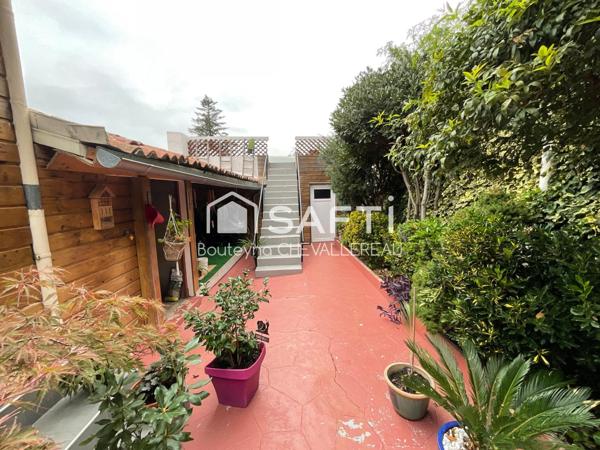 Maison de ville avec jardin et garage