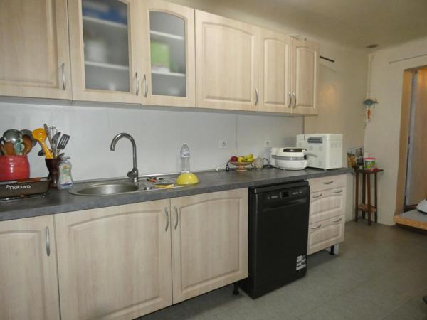 Maison de ville plain pied 102m² sur terrain arboré de 261m² avec garage