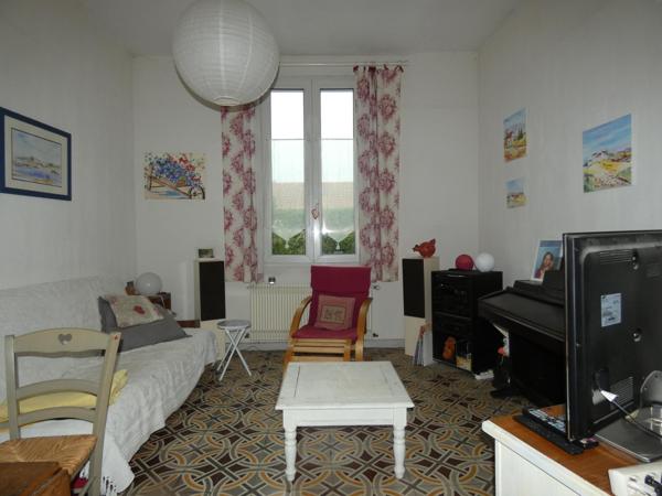 Maison de ville plain pied 102m² sur terrain arboré de 261m² avec garage