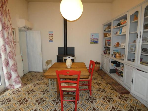 Maison de ville plain pied 102m² sur terrain arboré de 261m² avec garage