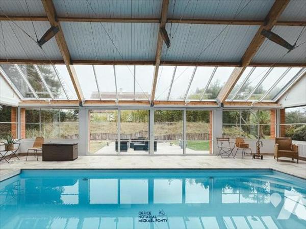 Amateurs de grands espaces et de confort, laissez vous séduire par cette magnifique maison lumi...