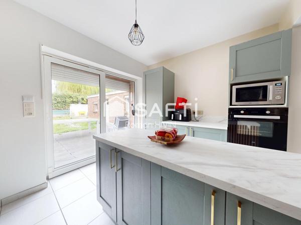 Maison familiale semi plain-pied, secteur calme avec jardin et double garage