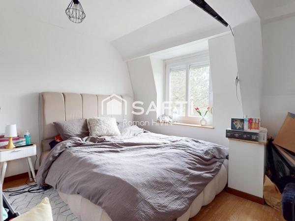 Maison familiale semi plain-pied, secteur calme avec jardin et double garage