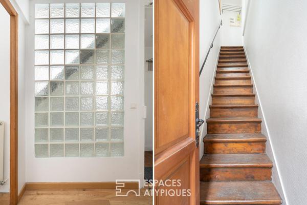 Esprit loft en dernier étage avec poutres apparentes