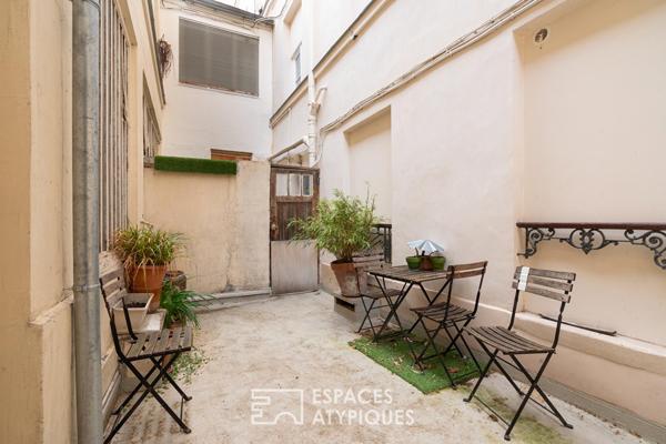 Esprit loft en dernier étage avec poutres apparentes