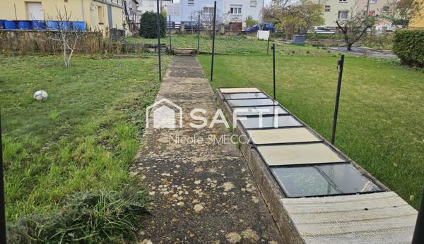 Maison mitoyenne,3 chambres,jardin,garage