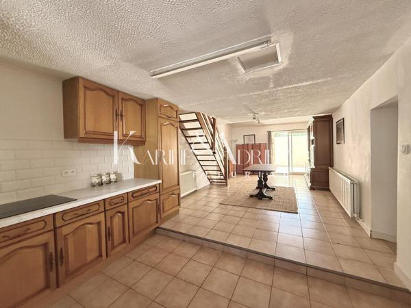 Maison de ville avec 2 chambres, mezzanine, bureau et garage