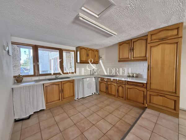 Maison de ville avec 2 chambres, mezzanine, bureau et garage