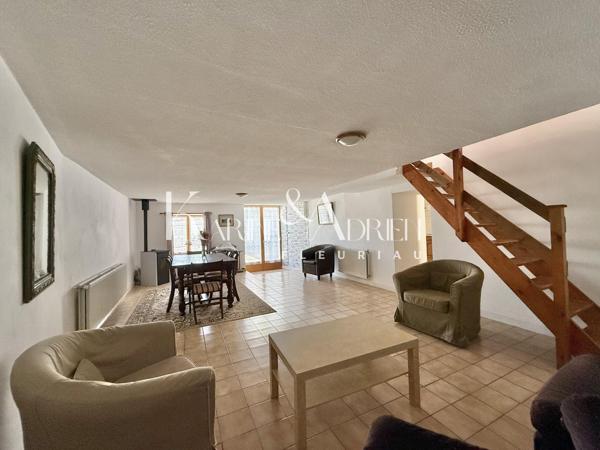 Maison de ville avec 2 chambres, mezzanine, bureau et garage