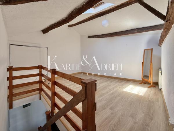 Maison de ville avec 2 chambres, mezzanine, bureau et garage