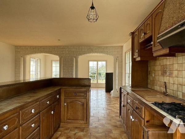 MAISON DE PLAIN-PIED SUR SOUS-SOL