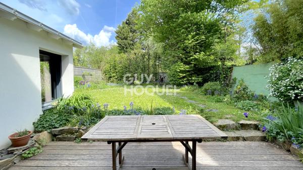 Maison familiale avec grand jardin arboré