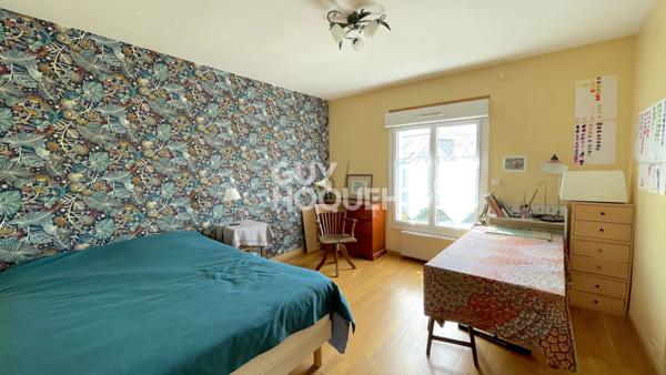 Maison familiale avec grand jardin arboré