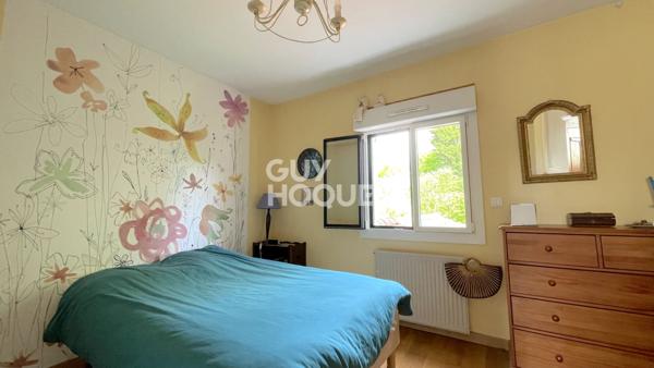 Maison familiale avec grand jardin arboré