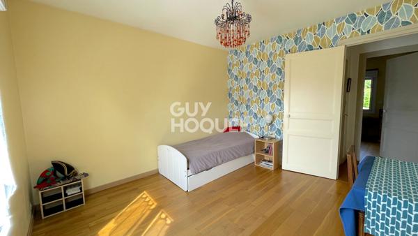 Maison familiale avec grand jardin arboré