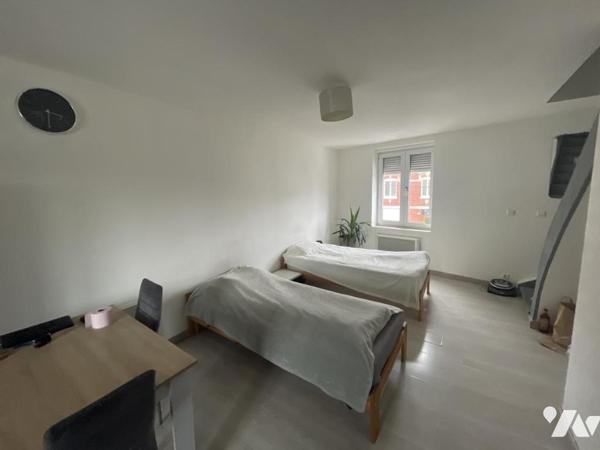 Immeuble mixte – Local professionnel 49 m² + T2 loué – Idéal investisseur