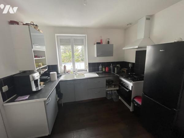 Immeuble mixte – Local professionnel 49 m² + T2 loué – Idéal investisseur