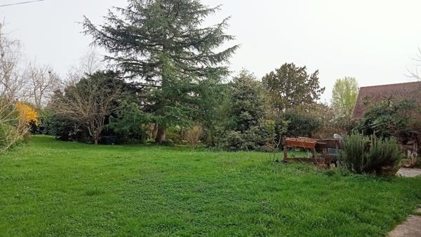 Corps de ferme au grand espace sur vue dégagée.