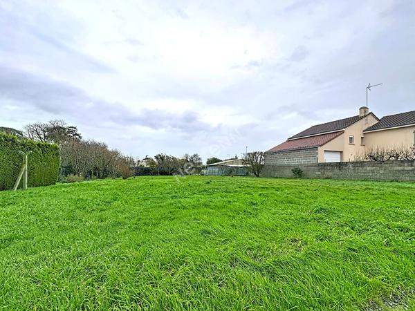 Maison familiale à vendre au Marillais - 4 chambres, garage et grand jardin.