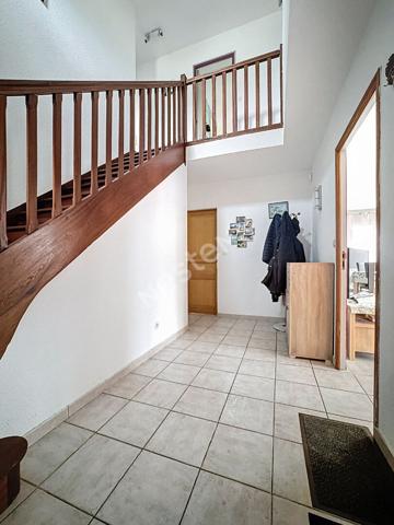 Maison familiale à vendre au Marillais - 4 chambres, garage et grand jardin.