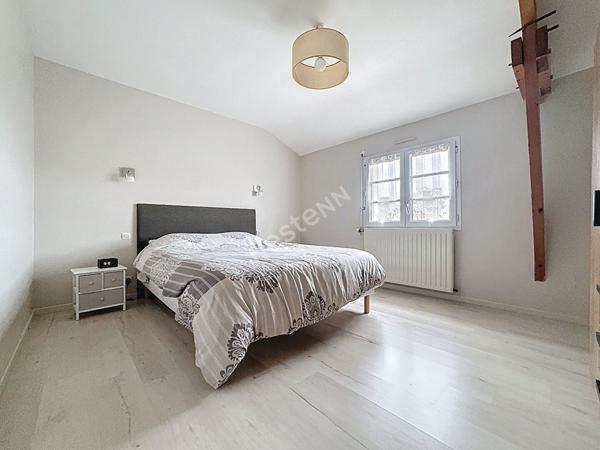 Maison familiale à vendre au Marillais - 4 chambres, garage et grand jardin.