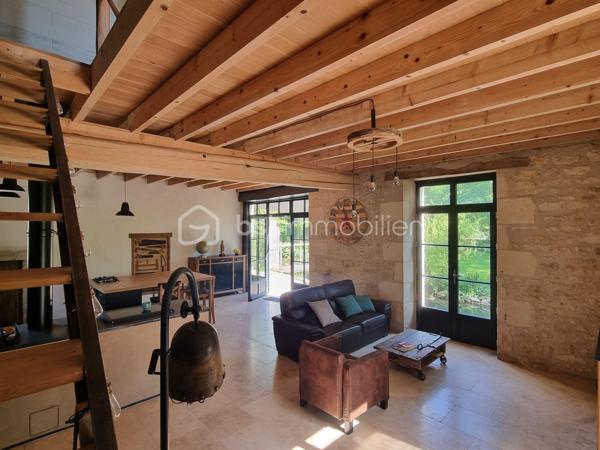 Nous vous proposons ce moulin rénové avec goût totalement isolé. 

Il se compose d'une première partie d'environ 90 m2, composée d'une grande pièce de vie avec cuisine, ouverte sur une terrasse surplombant la rivière. Les grandes ouvertures apportent un bain de lumière au rez-de-chaussée, tout en offrant un sentiment de dehors / dedans et une vue imprenable sur la rivière et le parc.
Il y a également un accès sur l'arrière de la propriété ainsi qu'un WC séparé. Dans la cuisine, une ouverture permet d'accéder au mécanisme du moulin (la roue ayant été supprimée).
A l'étage : une chambre, une salle d'eau avec wc, une mezzanine pouvant servir de deuxième chambre.
Cette première partie est entièrement chauffée par un poêle de masse.
La rénovation a été réalisée avec soin dans l'optique de respecter les éléments anciens du moulin. Les murs sont en chaux/chanvre, les sols sont en travertin au rez-de-chaussée  et en parquet à l'étage. Poutres et pierre subliment également cette espace de vie unique.

En prolongement du bâti, un second logement d'environ 45 m2, permettant d'accueillir famille ou amis, se compose d'une pièce de vie avec cuisine, une chambre, une salle d'eau, WC séparés.

Une autre partie de 165m² environ est composée d'une grande pièce au rez-de-chaussée et de trois pièces à l'étage. Des travaux de rénovation sont actuellement en cours sur cette partie et seront à finir par le futur propriétaire.

De nombreuses dépendances dont une grange de 280 m². Un appentis pouvant abriter un camping car.

Parc de deux hectares.
Idéal Gites.

Situé à 10 minutes de Saint-Maixent-l'Ecole (gare TGV Paris Montparnasse - La Rochelle), 5 minutes des commerces de proximité, école et collège.
