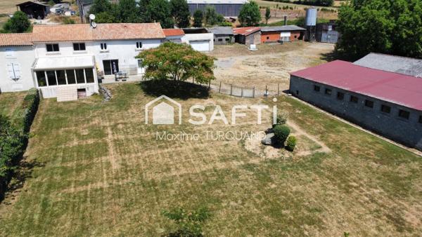 Maison 208m², 4 chambres, 1900m² de terrain + dépendances XL.