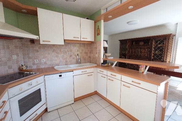 Appartement rez-de-jardin, 2 chambres, 65m²