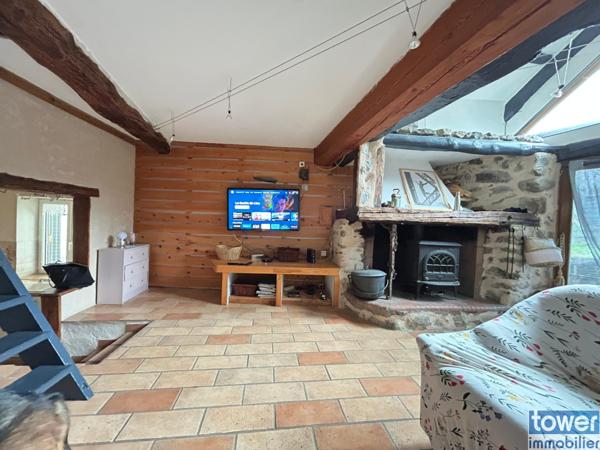 Maison en pierre de 100m² avec 4 chambres, un atelier et terrain