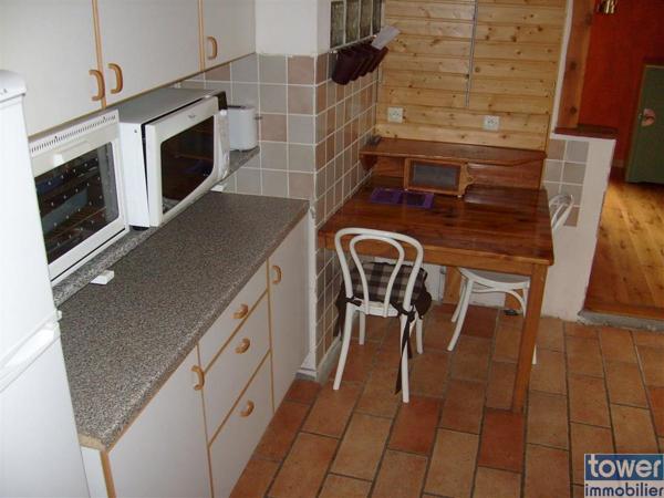 Maison en pierre de 100m² avec 4 chambres, un atelier et terrain