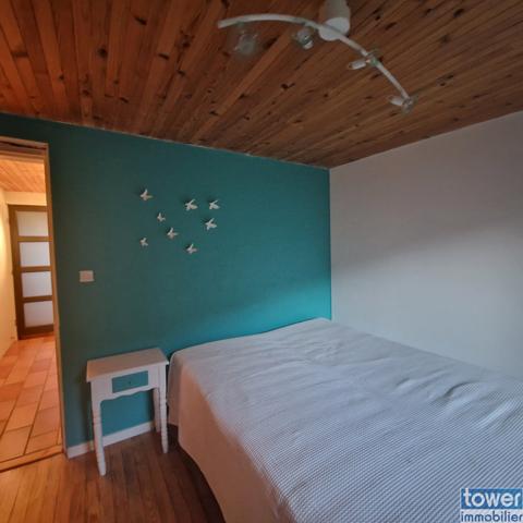 Maison en pierre de 100m² avec 4 chambres, un atelier et terrain