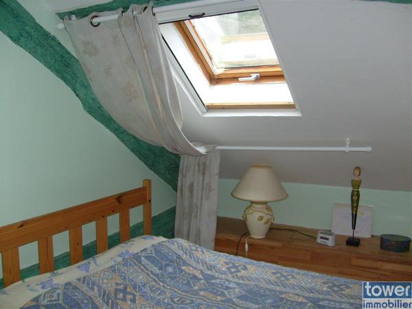 Maison en pierre de 100m² avec 4 chambres, un atelier et terrain