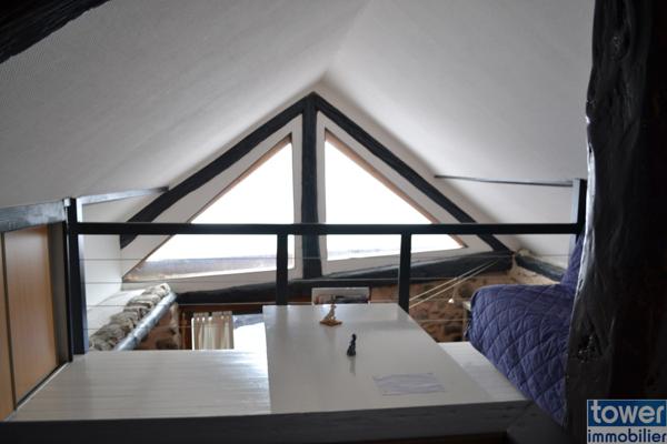 Maison en pierre de 100m² avec 4 chambres, un atelier et terrain