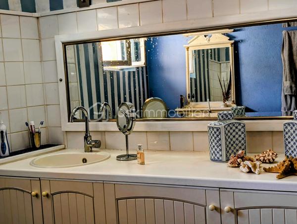 Maison de 296,70 m²