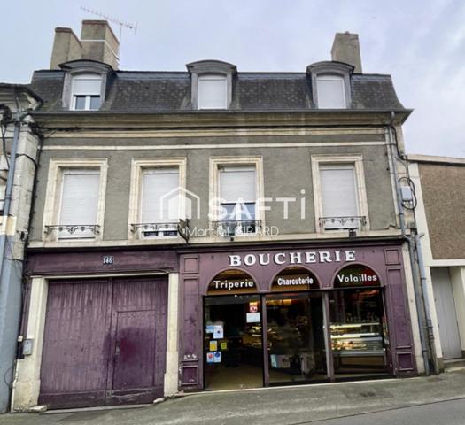 Immeuble avec commerce et trois appartements à Mehun sur Yèvre