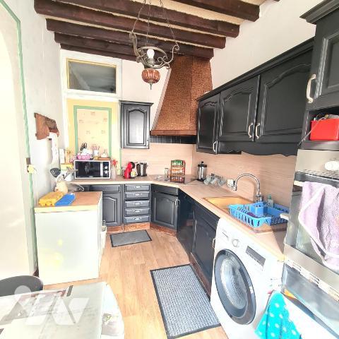 LOOS immeuble à usage commercial et d'habitation avec parking