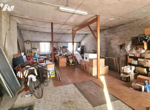 LOOS immeuble à usage commercial et d'habitation avec parking