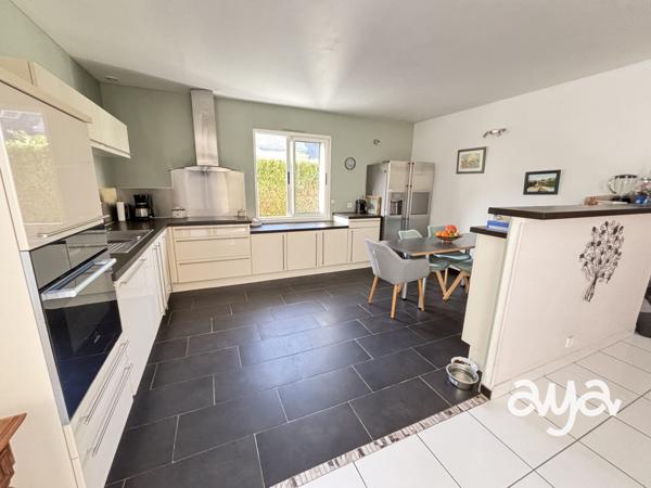 Maison familiale lumineuse dans un cadre verdoyant