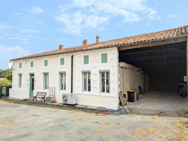 Maison en pierre économe en énergie, dépendances et près de 8 000 m² de terrain