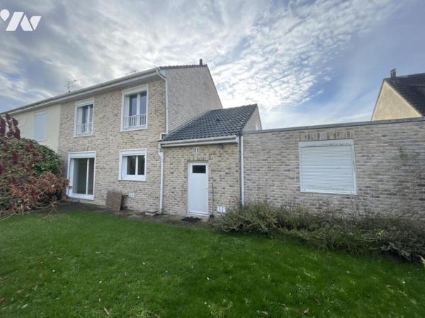 Semi plain-pied 124 m2 sur 416 m2  4 chambres dont une au rdc jardin garage