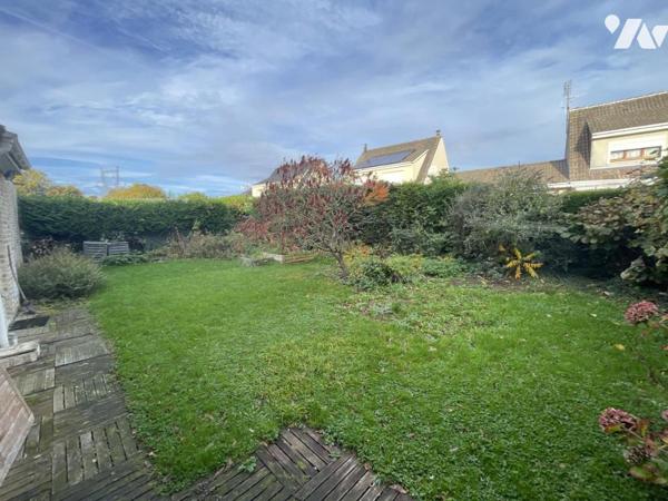 Semi plain-pied 124 m2 sur 416 m2  4 chambres dont une au rdc jardin garage