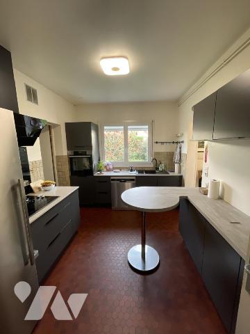 Semi plain-pied 124 m2 sur 416 m2  4 chambres dont une au rdc jardin garage