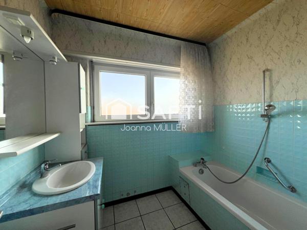 Maison Mitoyenne T5 de 91 m2 sur 2,36 ares avec un sous-sol complet et un extérieur aménagé
