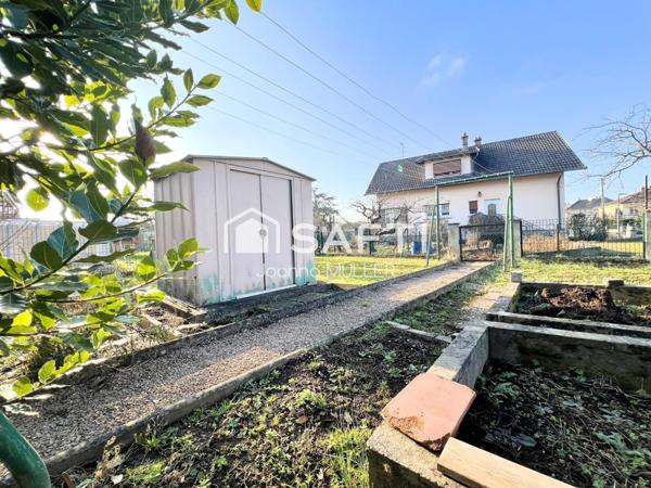 Maison Mitoyenne T5 de 91 m2 sur 2,36 ares avec un sous-sol complet et un extérieur aménagé