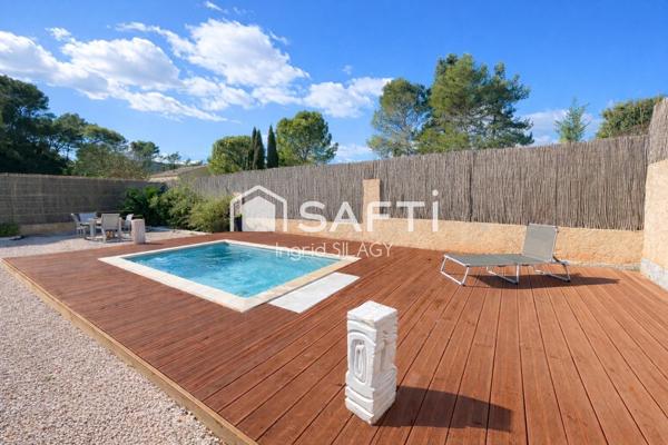 Maison lumineuse avec véranda, piscine et garage