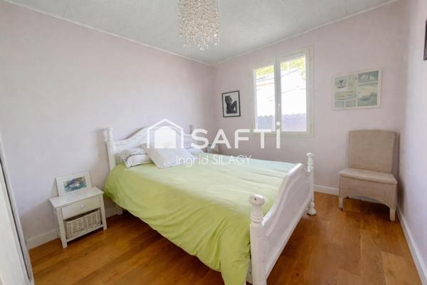 Maison lumineuse avec véranda, piscine et garage