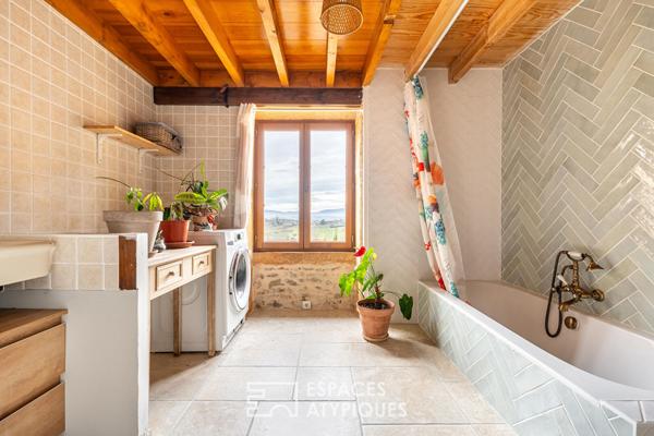 Maison en pierres dorées avec vue plein Sud